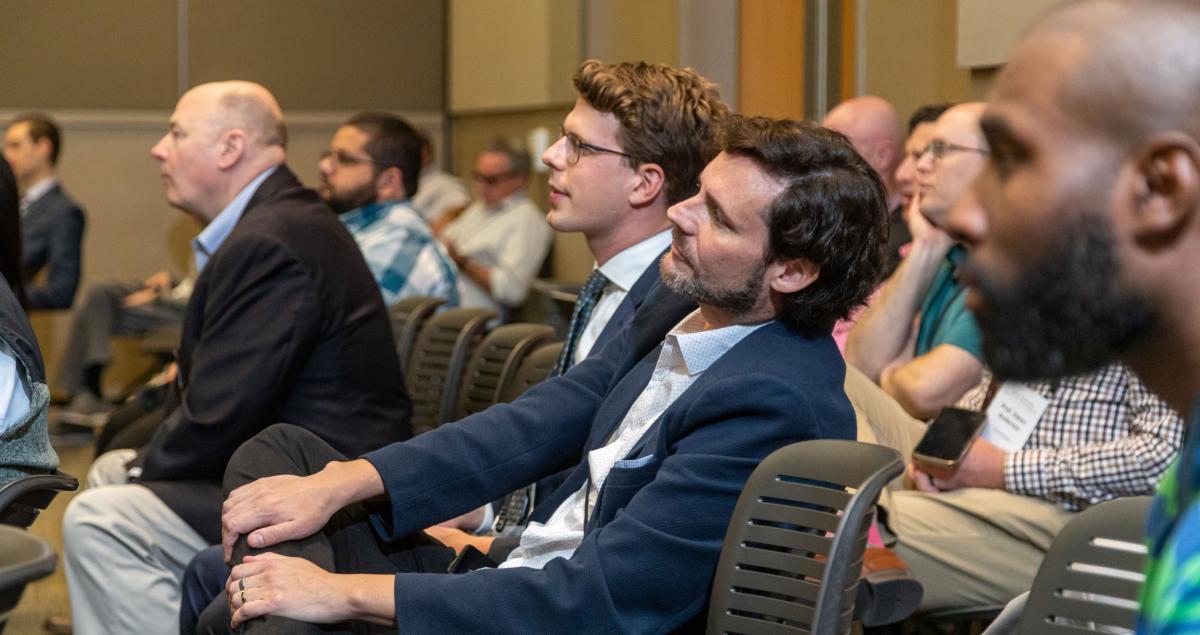 Attendees listening to a lecture.