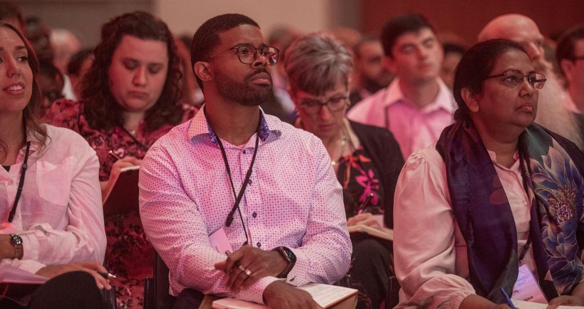 Attendees listening to a lecture.